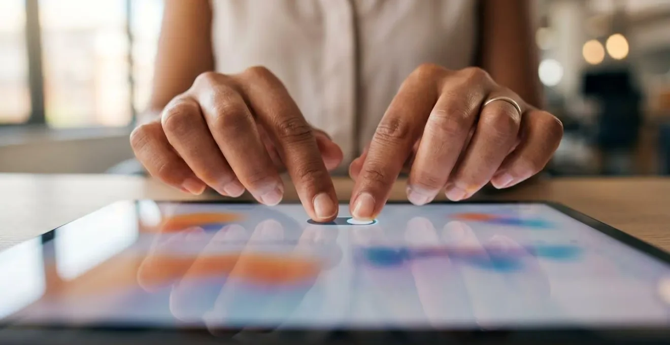 Close-up of hands adjusting scenario controls on financial modeling dashboard